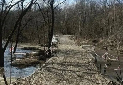 Вода ушла с дороги в деревню Афанасово